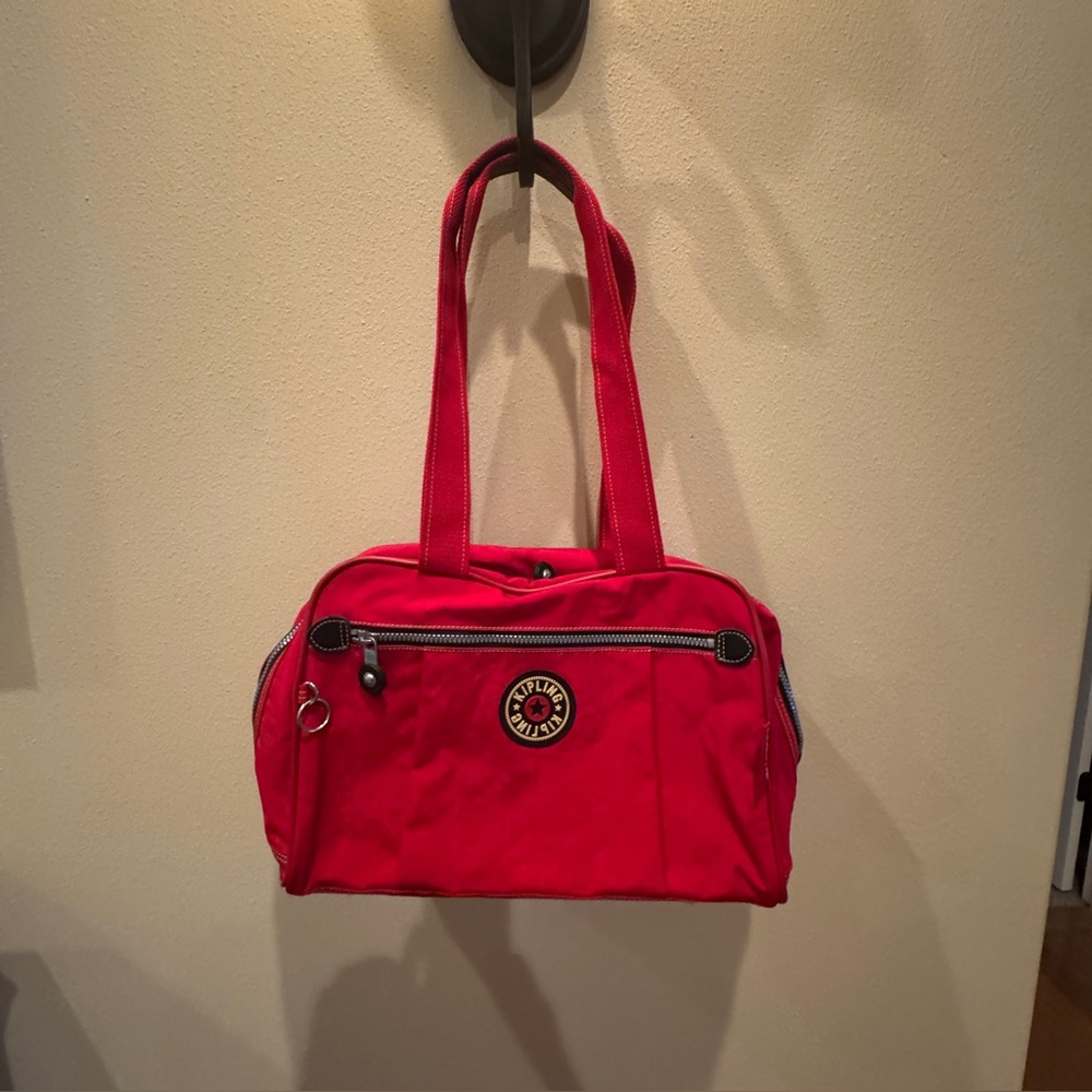 KIPLING DUFFLE TRAVEL BAG red. Vintage